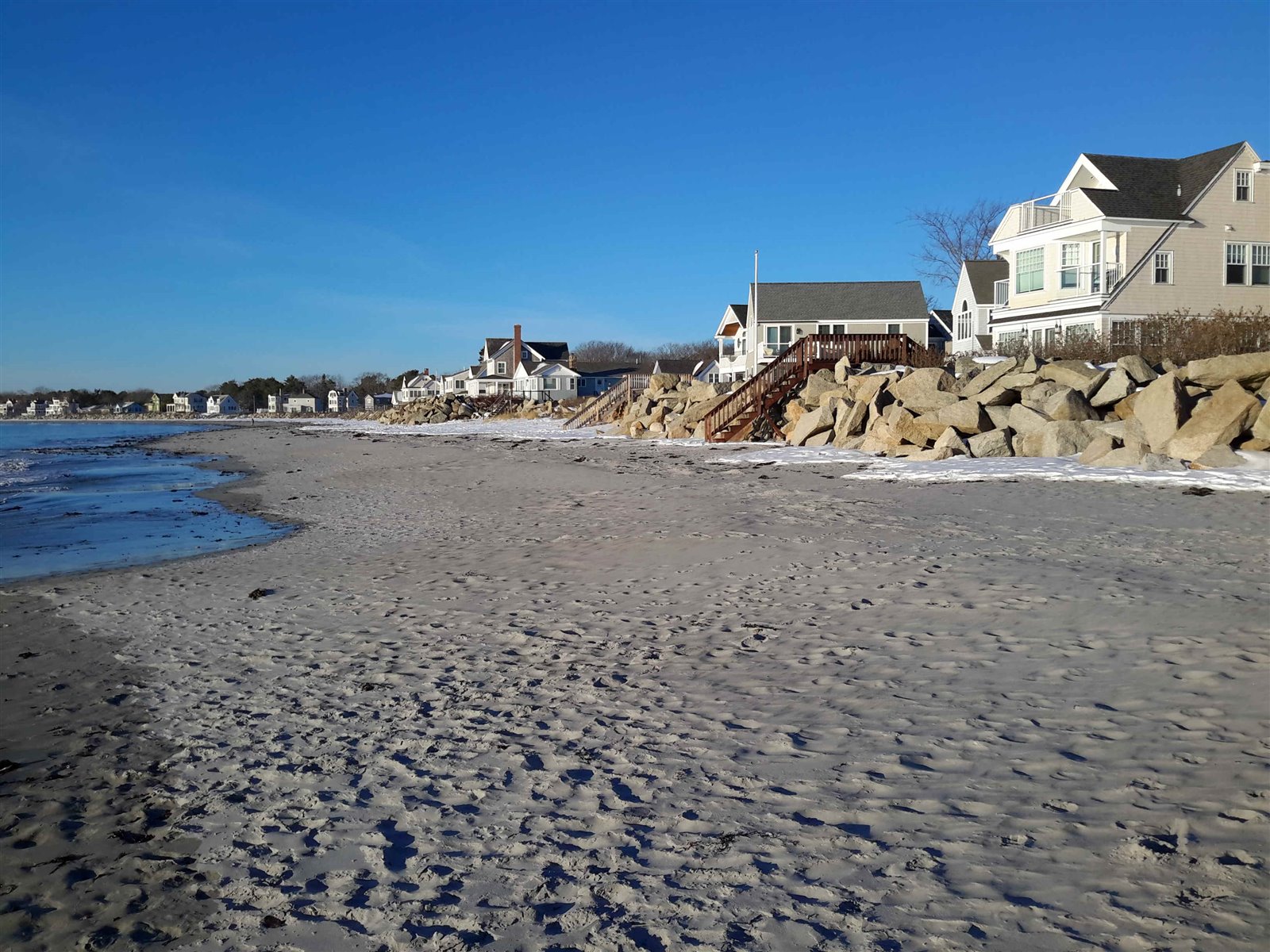 Beachfront properties and shoreline conditions at Goose Rocks Beach in Maine